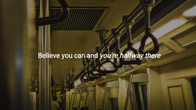 empty train car bathed in warm light with an uplifting quote about belief and progress